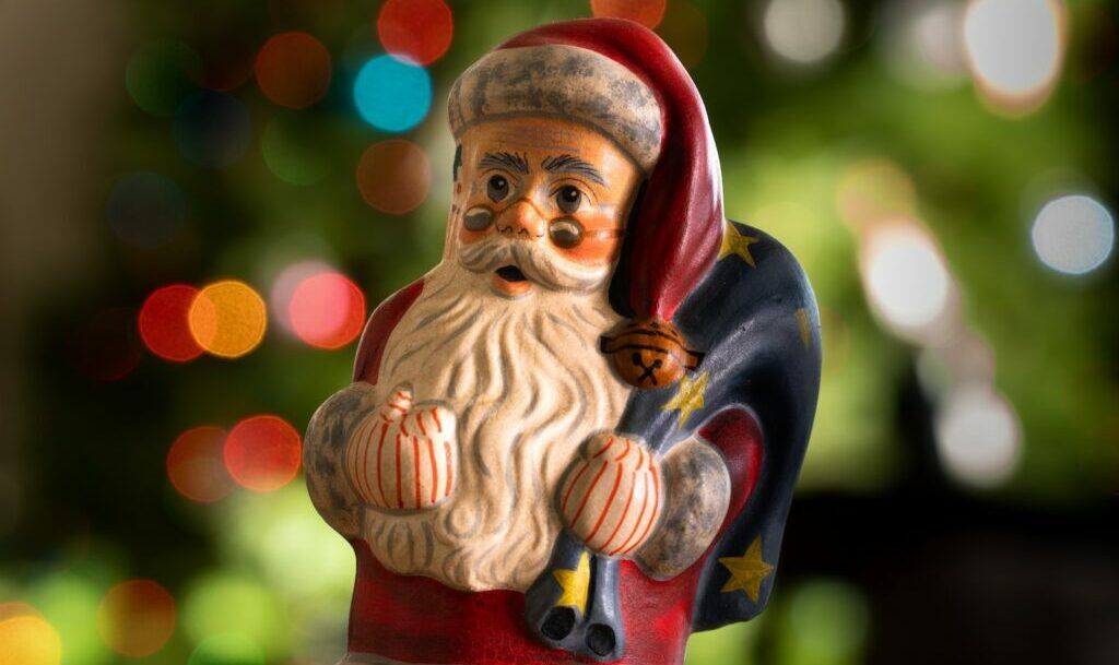 red and brown ceramic figurine